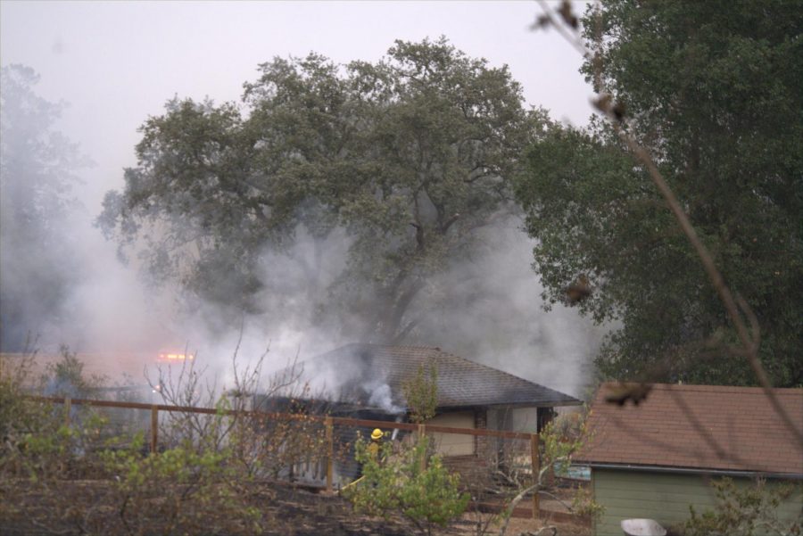 Firefighters douse flames on a pool house in east Santa Rosas Skyhawk community.