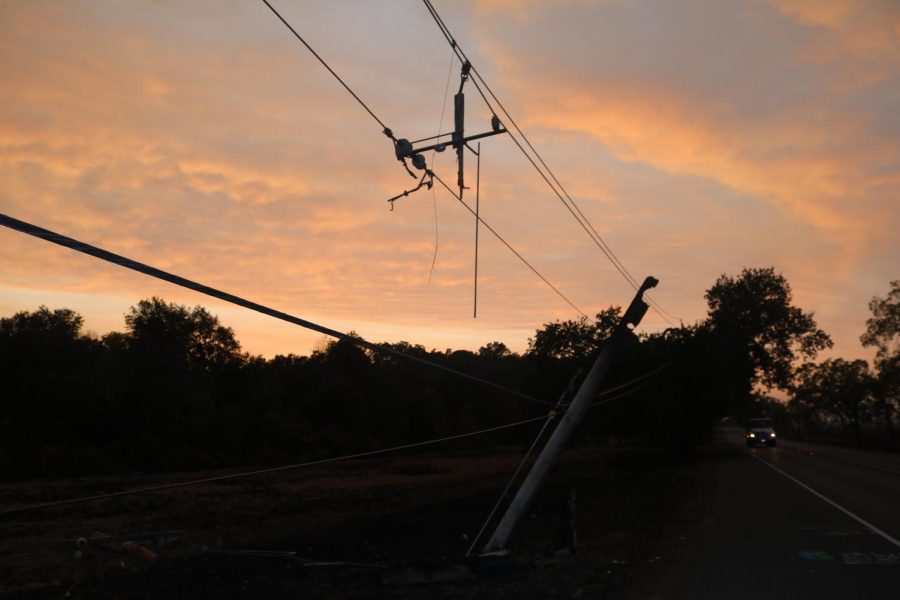 A utility pole along Hwy 12 that caught fire, resulting in the pole splintering into three pieces.