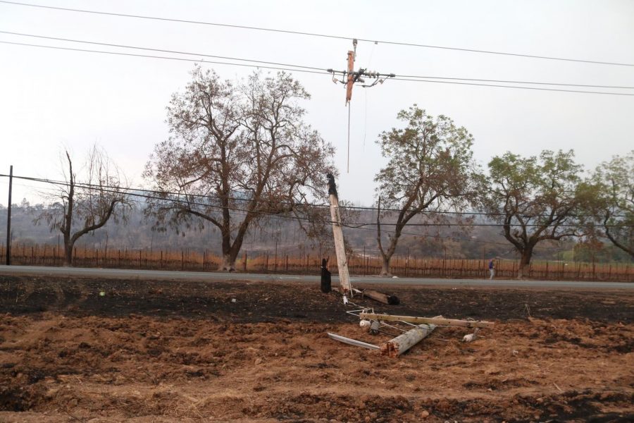 A utility pole along Hwy 12 that caught fire, resulting in the pole splintering into three pieces.