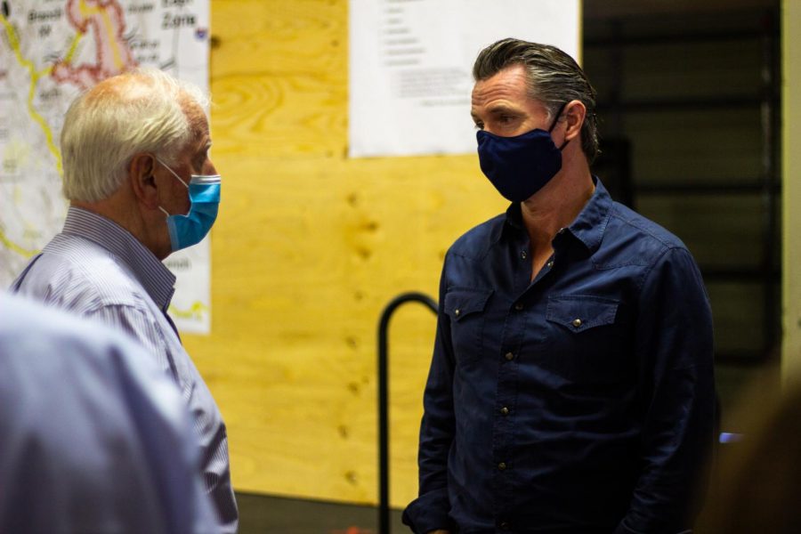 Congressman Mike Thompson and Governor Gavin Newsom in conversation after a Cal Fire press briefing during the LNU Lightning Complex Fire.