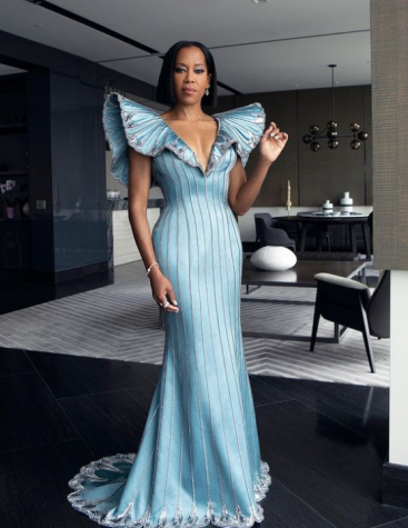 Regina King wearing a light blue Louis Vuitton gown with silver details.