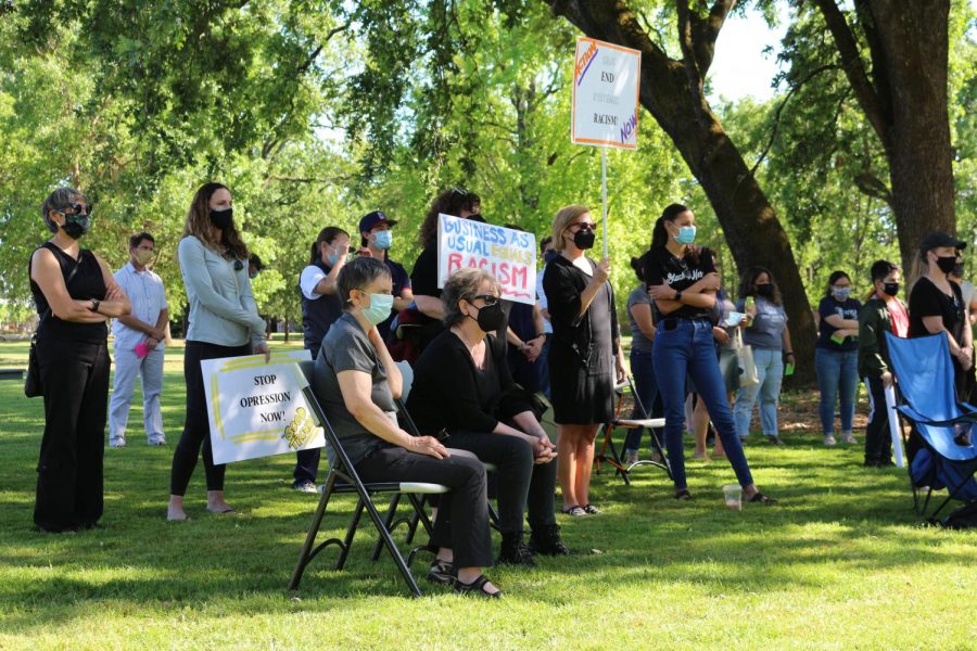 Participants show their support for ending racism at SRJC. 