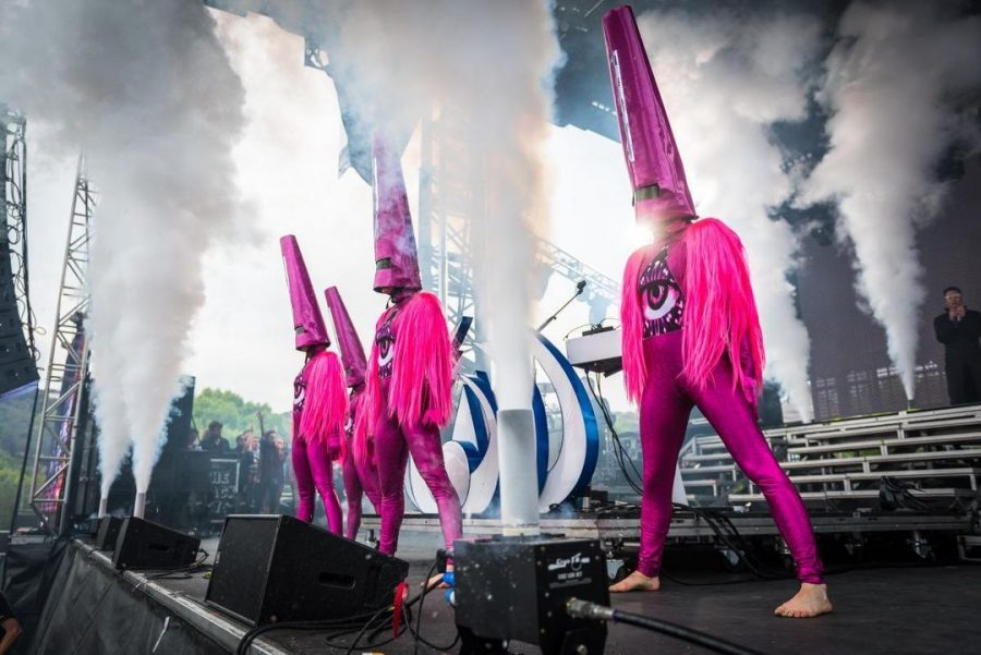 The band Empire of the Sun wearing original second-hand pink costumes with pointy pink hats made by designer Svetlana Shigroff.