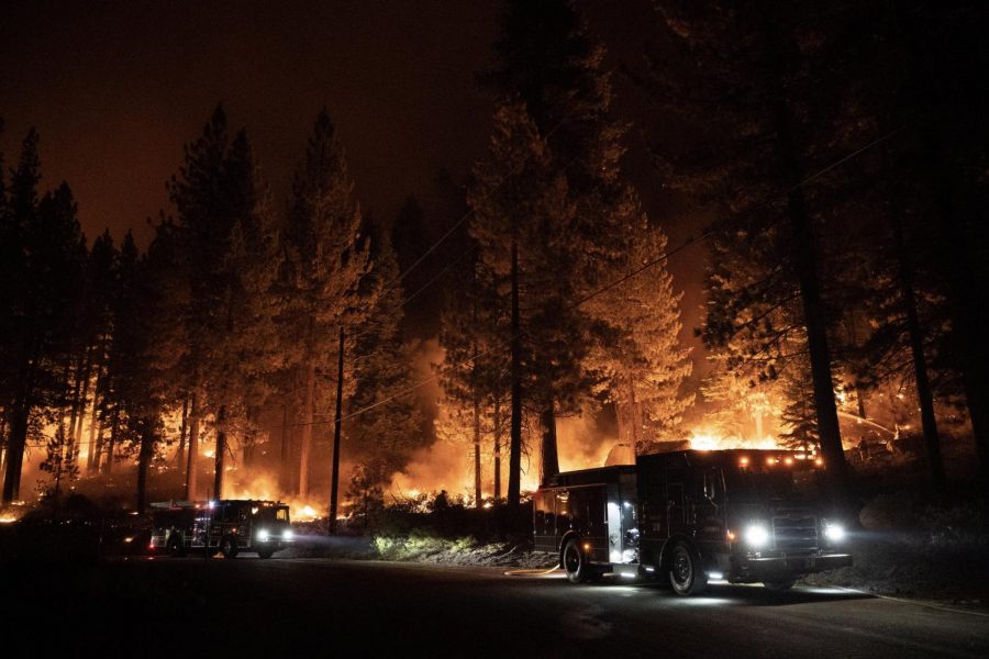 Two of the 490 fire engines fighting the Caldor Fire arrive near South Lake Tahoe early Tuesday. Over 30 agencies have committed people and resources to fighting this fire, which Gov. Gavin Newsom deemed the top priority amongst California's 15 major wildfires at a press conference Tuesday.