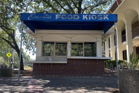 The blue-roofed and red brick kiosk has windows and counters where students can pick-up their food and beverages.