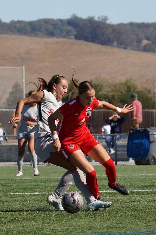 Midfielder Abria Brooker fights for possession with Sierra defender Zitlali Herrera. Brooker stayed aggressive throughout the game and scored the Bear Cubs only goal in the teams loss to Sierra College Oct. 15.