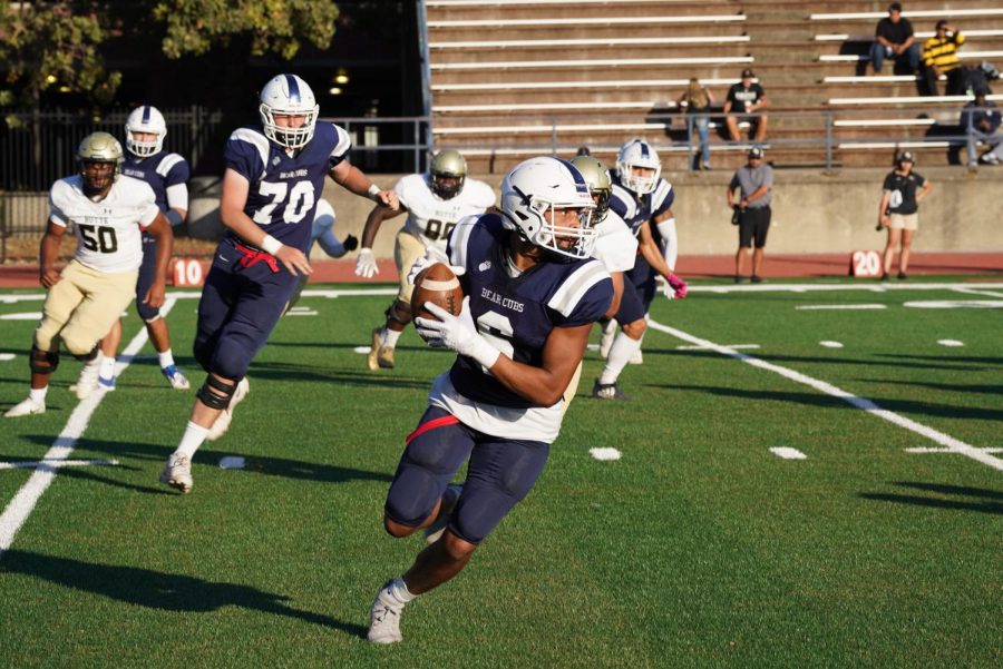 SRJC Bear Cubs wide receiver Micah Fontenot (6) catches a pass by quarterback Jake Simmons (3) in the Bear Cubs' second drive of the game and gets a first down to continue the drive at Bailey Field in SRJC's 29-21 2OT loss to Butte College Oct. 16.