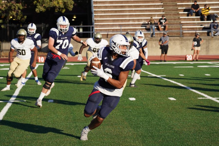 SRJC Bear Cubs wide receiver Micah Fontenot (6) catches a pass by quarterback Jake Simmons (3) in the Bear Cubs second drive of the game and gets a first down to continue the drive at Bailey Field in SRJCs 29-21 2OT loss to Butte College Oct. 16.