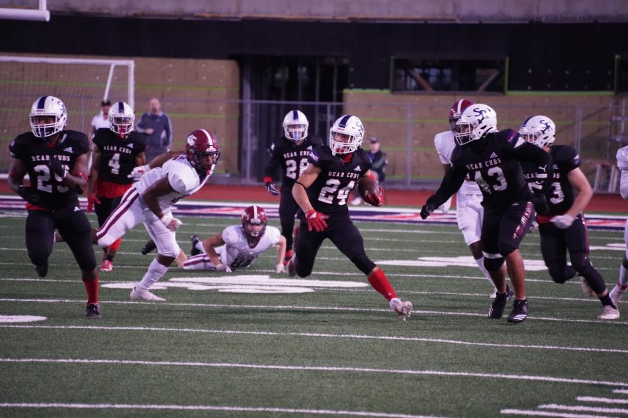 Adrian Torres (24) returns a kickoff for 30 yards, which lead do the Bear Cub's first scoring drive on Nov. 13 at Bailey Field.