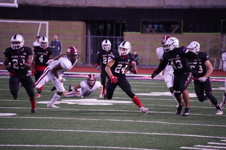 Adrian Torres (24) returns a kickoff for 30 yards, which lead do the Bear Cubs first scoring drive on Nov. 13 at Bailey Field.