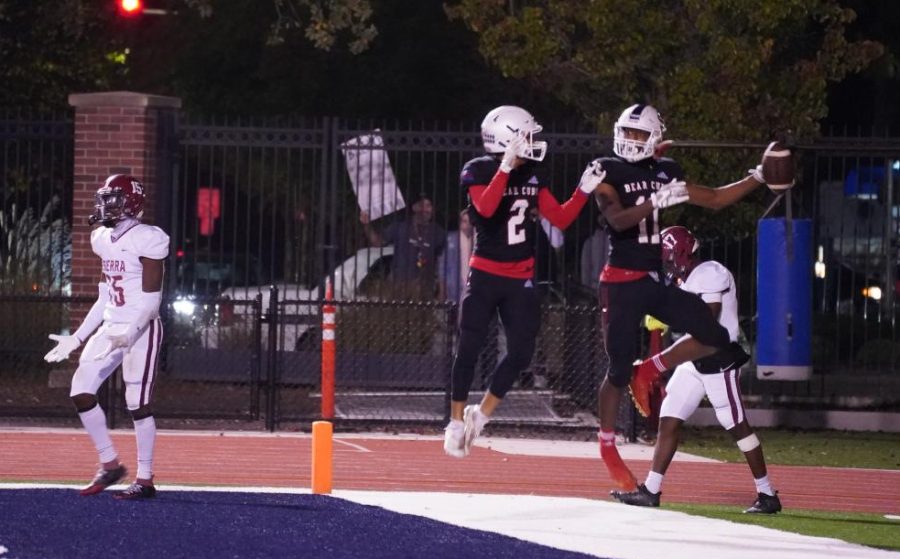 Slot back Blake Thomas (2) and wide receiver Preston Williams (11) celebrate Williams’ 17 yard touchdown reception to tie the game 14-14 on Nov. 13 at Bailey Field.