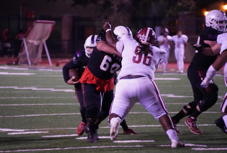 Offensive guard Kaleb Torres (60) blocks Sierra College defensive linemen Nick Diez (96) during a run play on Nov. 13 at Bailey Field.