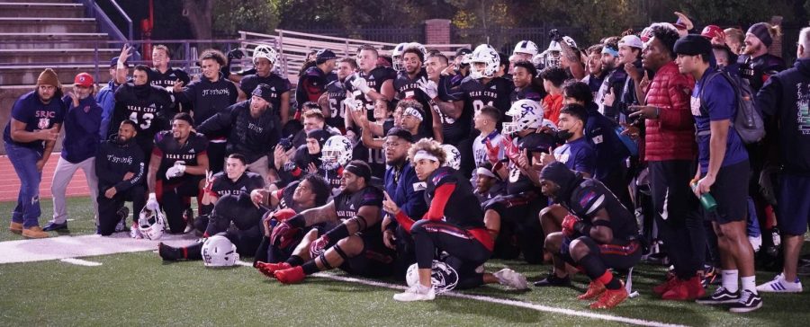 The Bear Cubs pose for pictures as team after defeating Sierra College in the last game of the 2021 season on Nov. 13 at Bailey Field.