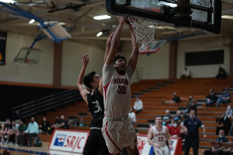 Edward Turner (33) dunks to give the momentum to the Bear Cubs in their win against Diablo Valley on Feb. 11.