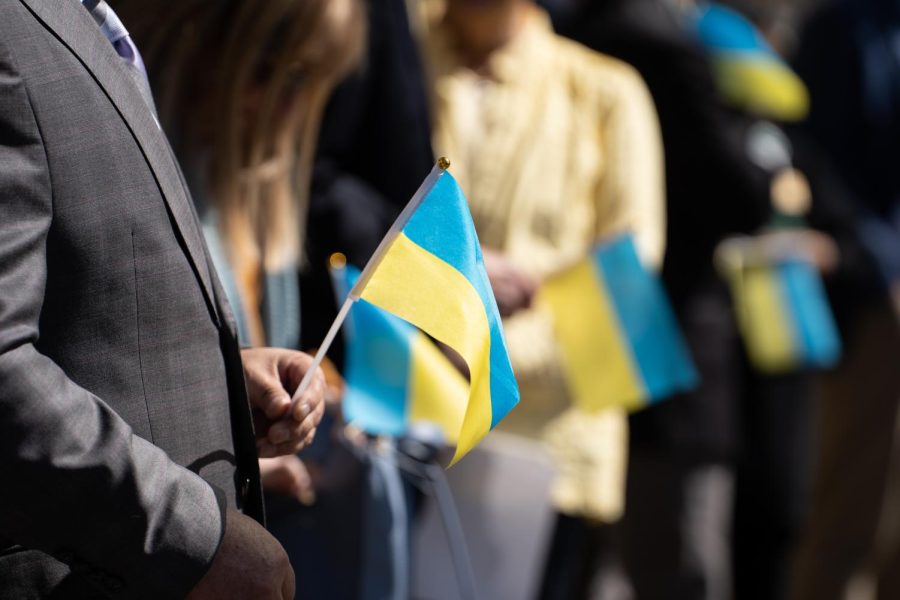 Elected officials welcome Ukraine Consul General Dmytro Kushneruk with a row of Ukrainian flags in front of City Hall in Sonoma, Calif. March 17, 2022.