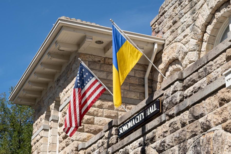 An American and Ukrainian flag fly side by side on City Hall in Sonoma, Calif. March 17, 2022.