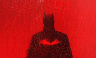 A silhouetted photo of Batman from The Batman.