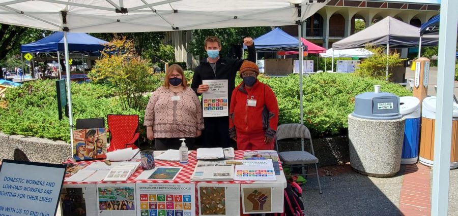 Students, families and volunteers came together to paint murals that spanned the whole of Elliott Avenue for Santa Rosa Junior College’s Earth Day event Friday.