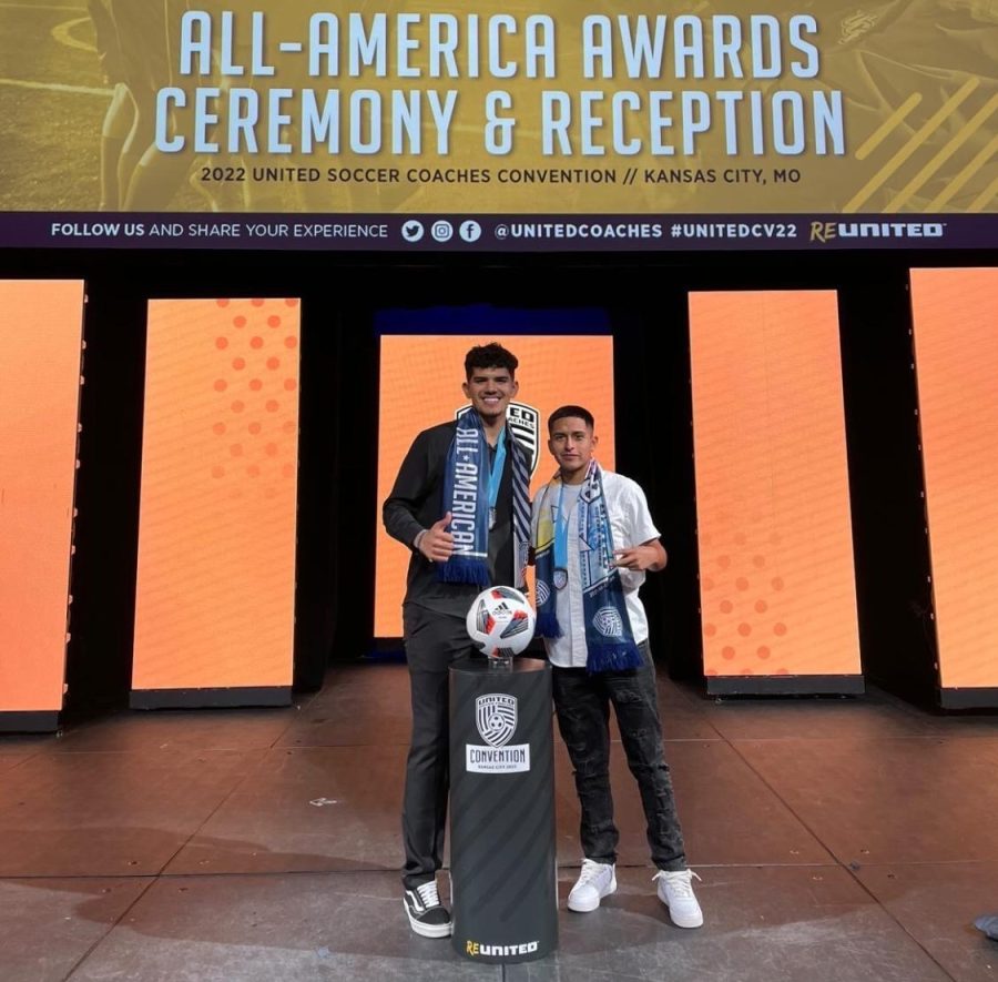 Alan Soto and Emanuel Padilla receive their All-American awards on stage at the 2022 United Soccer Coaches Convention in Kansas City, Missouri.