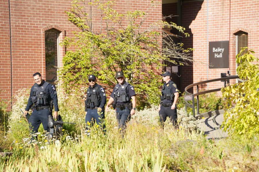 Sonoma County Sheriff's Office Bomb Squad members exit Santa Rosa Junior College's Bailey Hall after performing a sweep of the building on June 29, 2022 in Santa Rosa, California. 