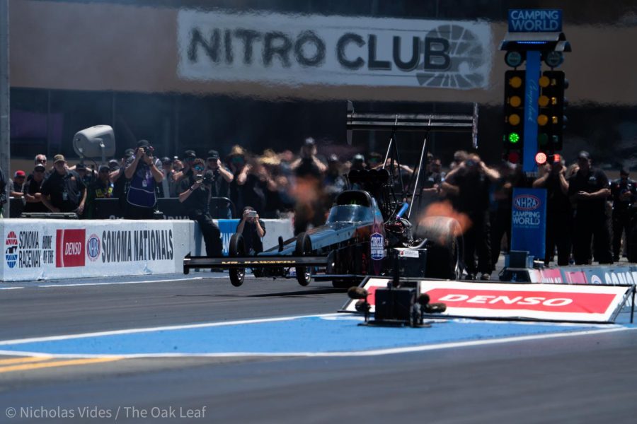 Top Fuel Driver Cameron Ferre takes air as he pushes off the start line during the Denso NHRA Sonoma Nationals on Saturday July 23, 2022.