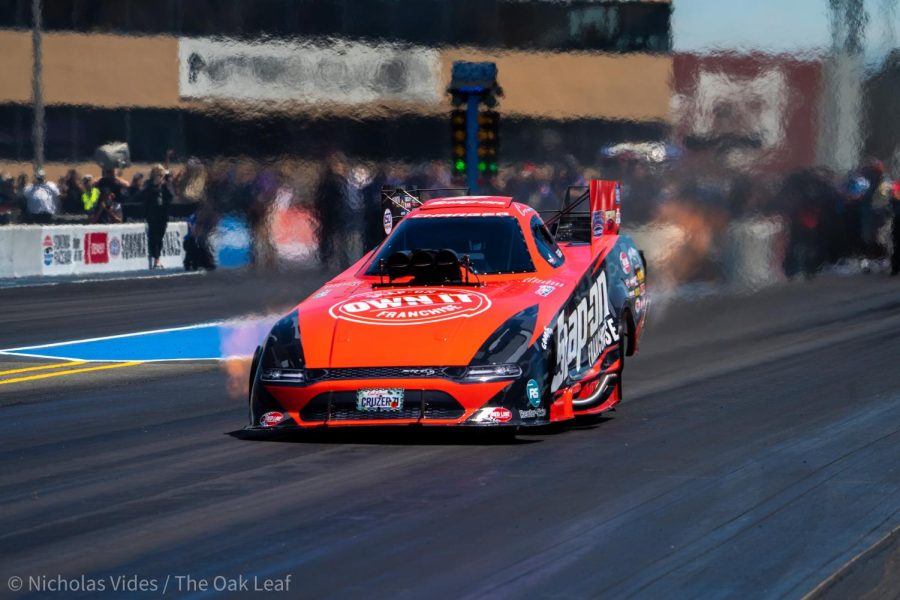 Funny Car Driver Cruz Pedregon defeats Ron Capps in a qualifying run at the Denso NHRA Sonoma Nationals on Saturday July 23, 2022.