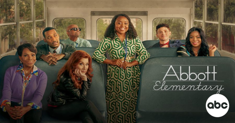 The cast of Abbott Elementary poses in the back of a school bus.