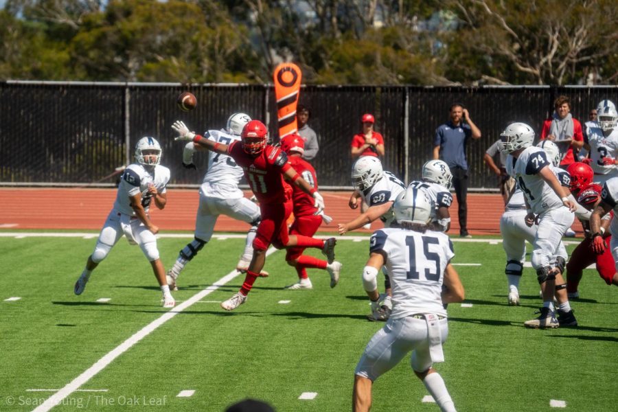 SRJC Bear Cubs quarterback Santino Chavez (12) throws a pass to wide receiver Isaac Torres (15) against the Rams defense at George M. Rush Stadium in SRJC’s 31-20 loss to City College of San Francisco on Sept. 3.