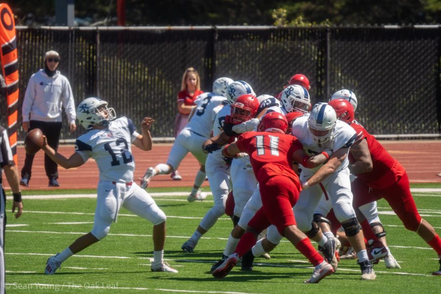 SRJC Bear Cubs quarterback Santino Chavez (12) slings a 30-yard touchdown pass to wide receiver Isaac Torres (15) to score SRJC's second touchdown of the game in SRJC’s 31-20 loss to City College of San Francisco on Sept. 3.