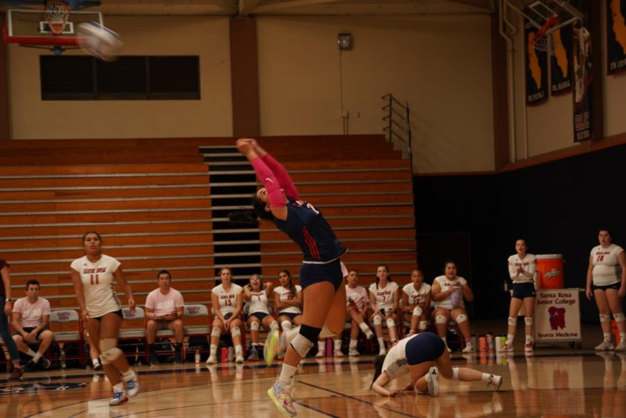 Freshman libero Daya Mosqueda makes a backwards pass in the Bear Cubs match against Folsom Lake.