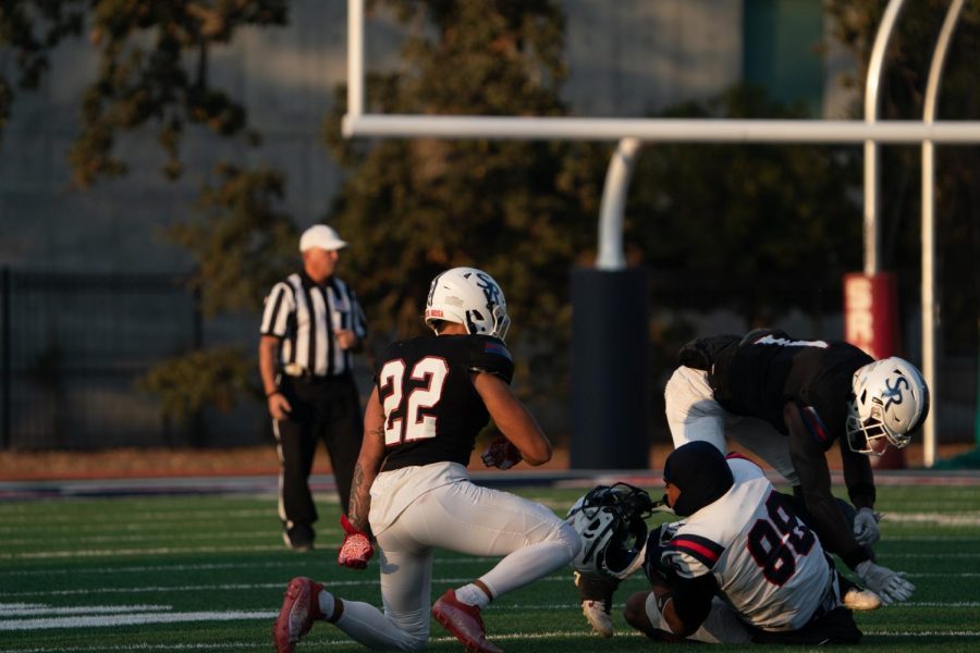 Santa Rosa Junior College linebacker Kobi Buckley and corner back Gyasi Mattison light up American River College tight end Ian Simpson, causing him to lose his helmet, on Saturday, Oct. 29, 2022 in Santa Rosa.