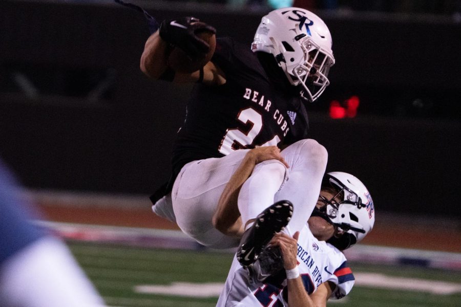 Running Back Adrian Torres hurdles an American River defender on a 44-yard kickoff return to potentially set up the Bear Cubs for a game-winning drive on Saturday, Oct. 29, 2022 in Santa Rosa.
