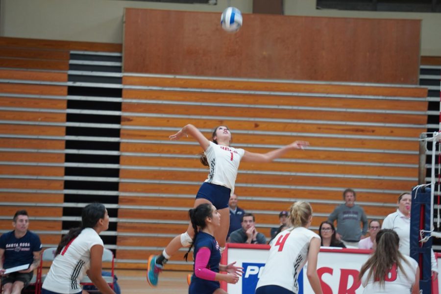 Bear Cubs Outside Hitter Sofia Lopez goes for a kill in the first set.
