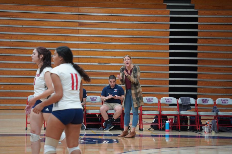 Head Coach Ally Sather encourages SRJC Bear Cubs in the fifth set.
