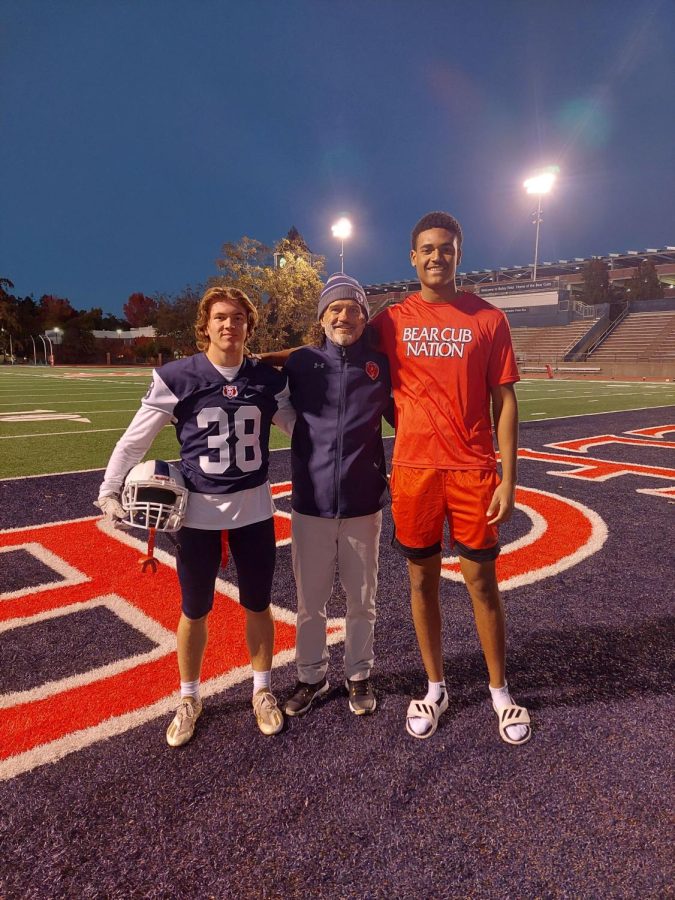 SRJC football coach Lenny Wagner (center) under the Bailey Field lights with Swiss-born strong safety Nils Lehmann (left) and France-born Malian tight end Dodji Dahoue (right). 