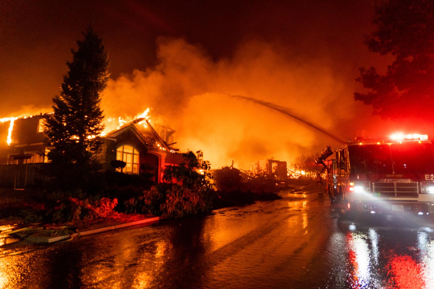 Firefighters on Mountain Hawk Road fight devastating flames as the Glass Fire moves in on eastern Santa Rosa Sept. 28, 2020.