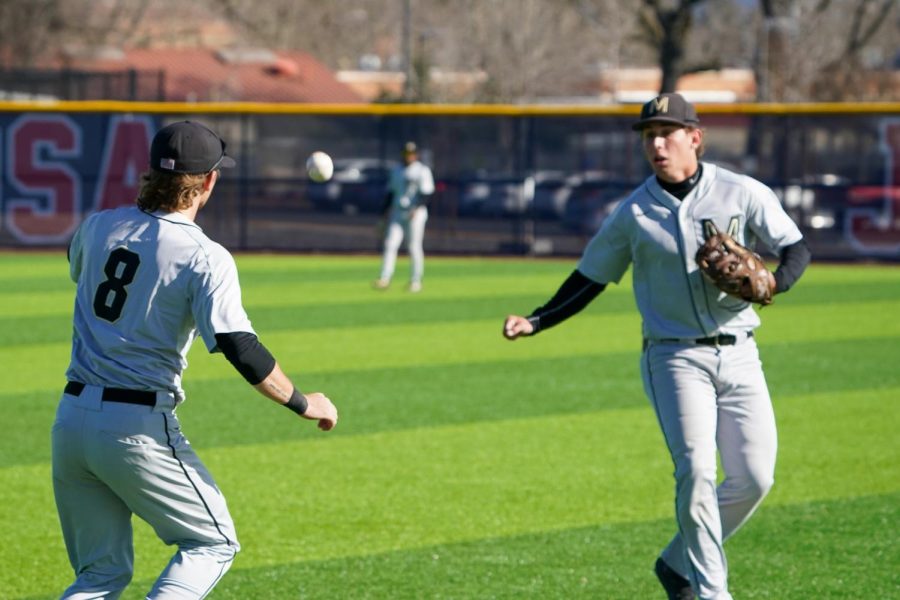 A Mariners first basemen and right fielder fail to come down with a pop fly as the wind carried the ball during Marin's error filled loss to Santa Rosa on Tuesday, Feb. 21, 2023 in Santa Rosa.
