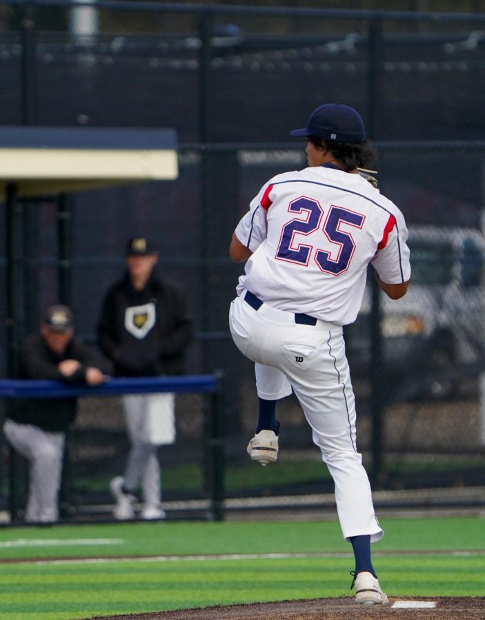 Pitcher Hekili Robello winds up before his pitch during SRJC's dominant win over College of Marin. Robello pitched a solid four innings for the Bear Cubs, which led SRJC pitchers this game, on Tuesday, Feb. 21, 2023 in Santa Rosa.