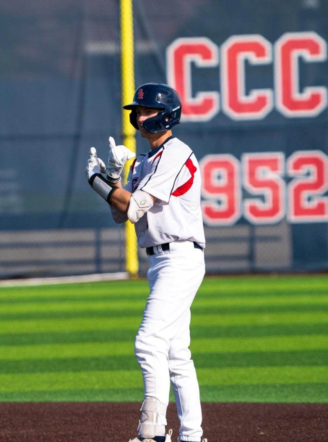 Bear Cubs outfielder Alex Leopard celebrates after hitting a stand-up double RBI against San Mateo College on Tuesday, Feb. 14, 2023 in Santa Rosa. 
