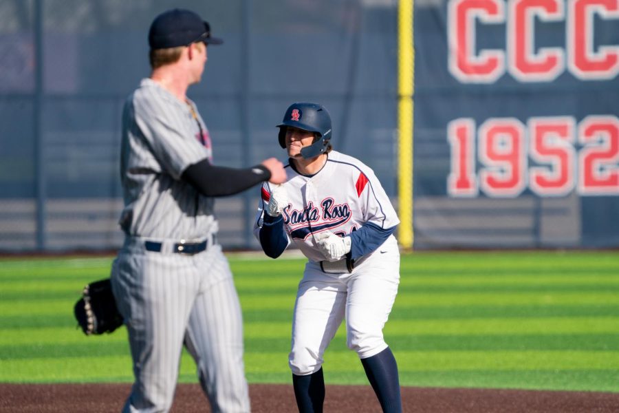 Bear Cubs infielder/pitcher Connor Sharpiot shimmies with joy after hitting an RBI double against San Mateo College on Tuesday, Feb. 14, 2023 in Santa Rosa. 