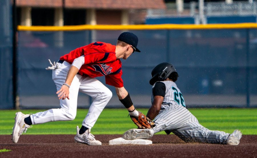 Bear Cubs catcher Ty Blakely throws out Mission College player Hasani Johnson on Saturday, Feb. 18, 2023 in Santa Rosa.