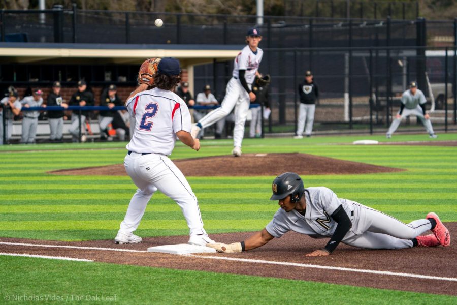 Bear Cubs pitcher Austin Ehrlicher attempts to pick off College of Marin outfielder D’Andre Gaines on Friday, Feb. 10, 2023 in Santa Rosa.