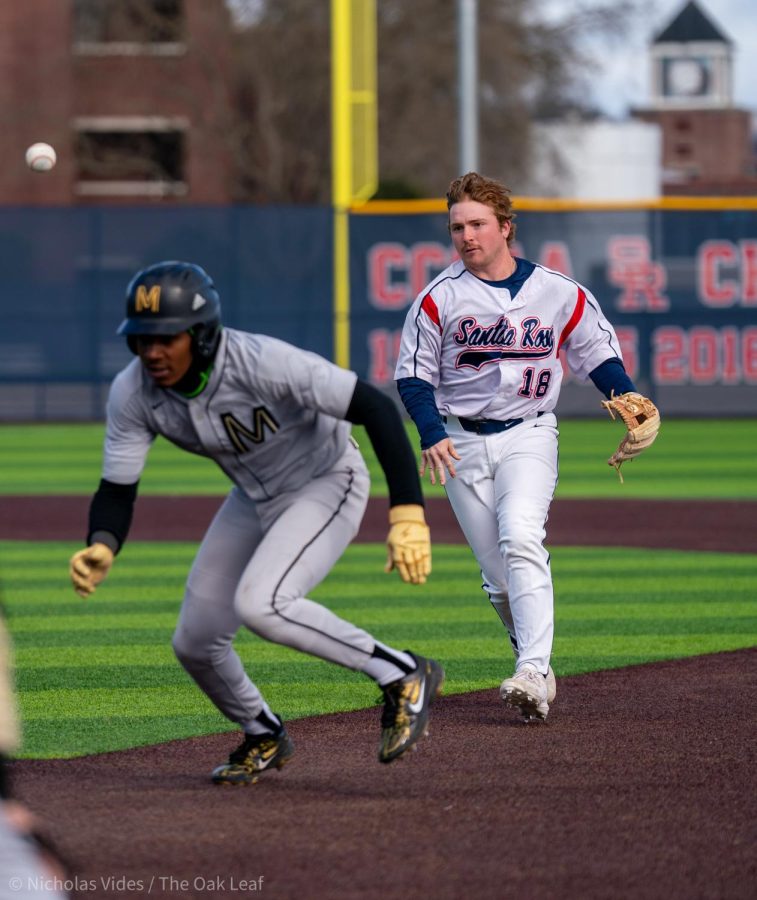 Bear Cubs infielder Joe Brown catches a College of Marin player in a pickle on Tuesday, Feb. 21, 2023 in Santa Rosa.