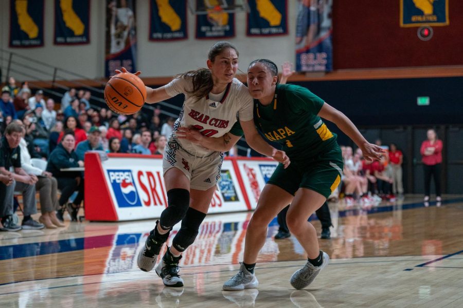 Forward Sheriene Arikat dribbles around a defender for an easy layup against Napa Valley on Saturday, Feb. 25 in Santa Rosa.
