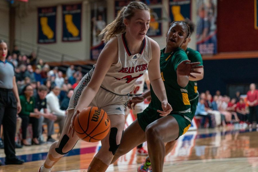 Forward Rose Nevin drives to the basket and scores two of her six points against Napa Valley on Saturday, Feb. 25 in Santa Rosa.
