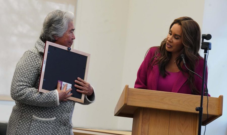 Dean Vanessa Luna Shannon presents a honorary degree to the Gutierrez family during the Feb. 14 Board of Trustees meeting in Petaluma. 