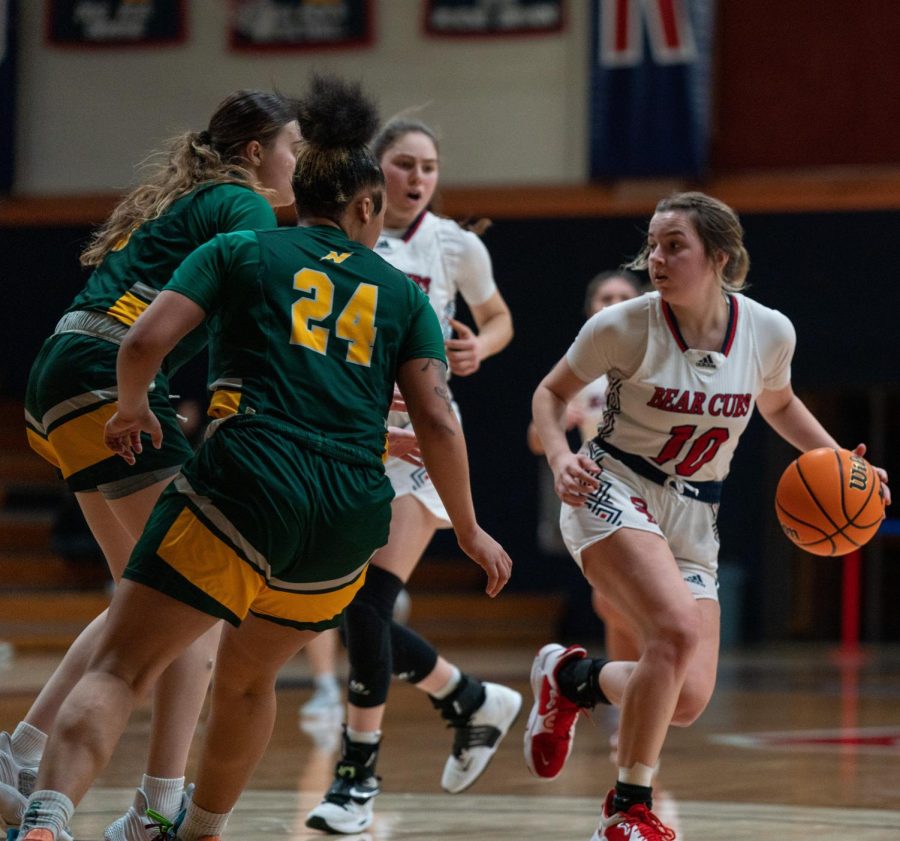 Guard Lucca Lowenberg avoids the double-team trap from Napa Valley defenders in the Bear Cubs win on Saturday, Feb. 25 in Santa Rosa.
