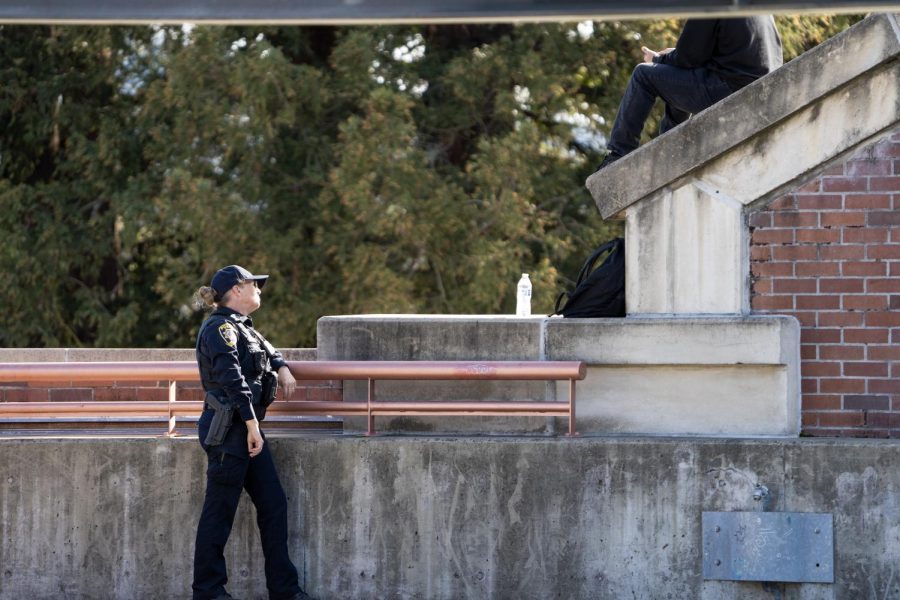 An SRJC Police officer speaks with an individual having a mental health crisis on the south side rooftop of the Zumwalt Parking Garage on Friday, Feb. 14, 2023 in Santa Rosa.