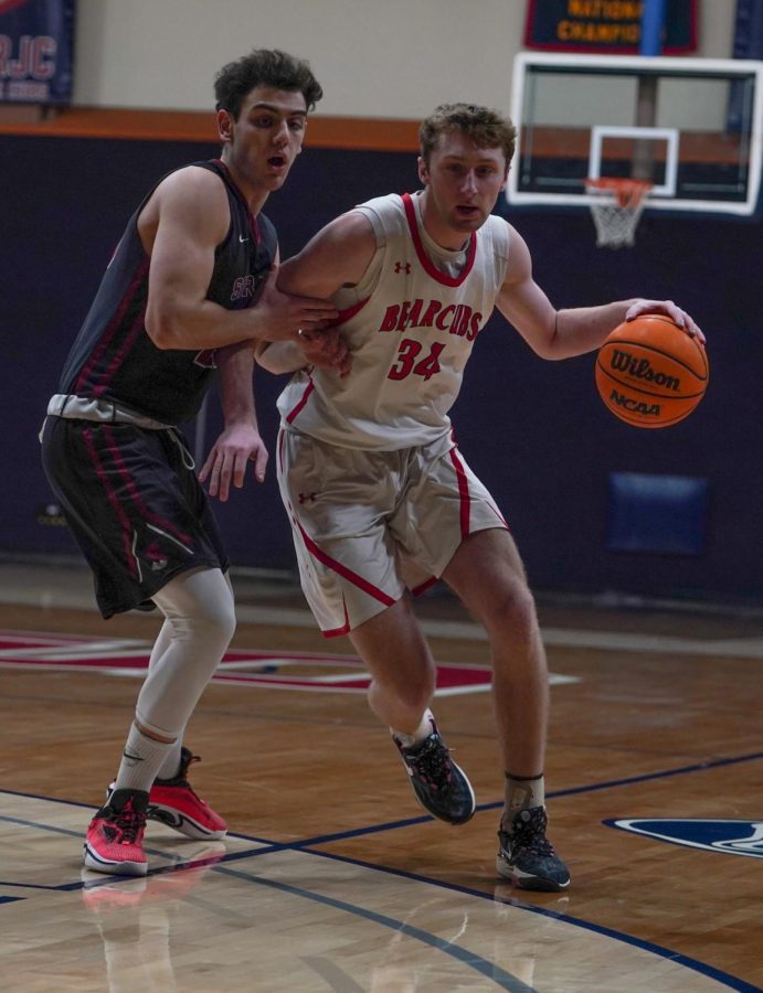 Freshmen forward Nolan Capurro drives to his left in a win over Sierra on Feb. 10 in Haehl Pavilion.