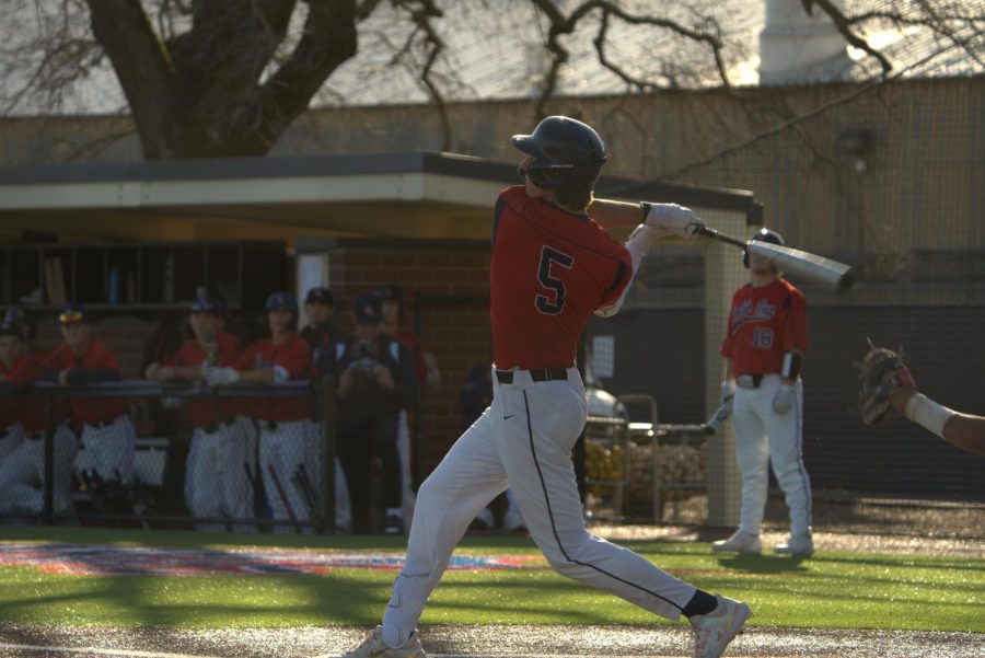SRJC Bear Cubs pitcher Austin Ehrlicher bats and gets his teammate Aidan Lombardi home.